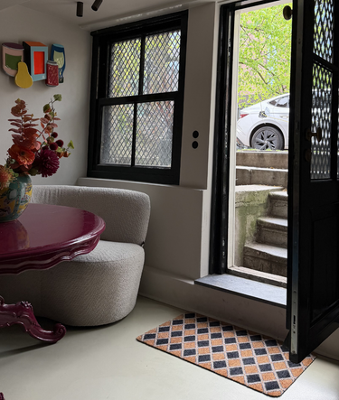 Deurmat met zwart en bruin circus print
